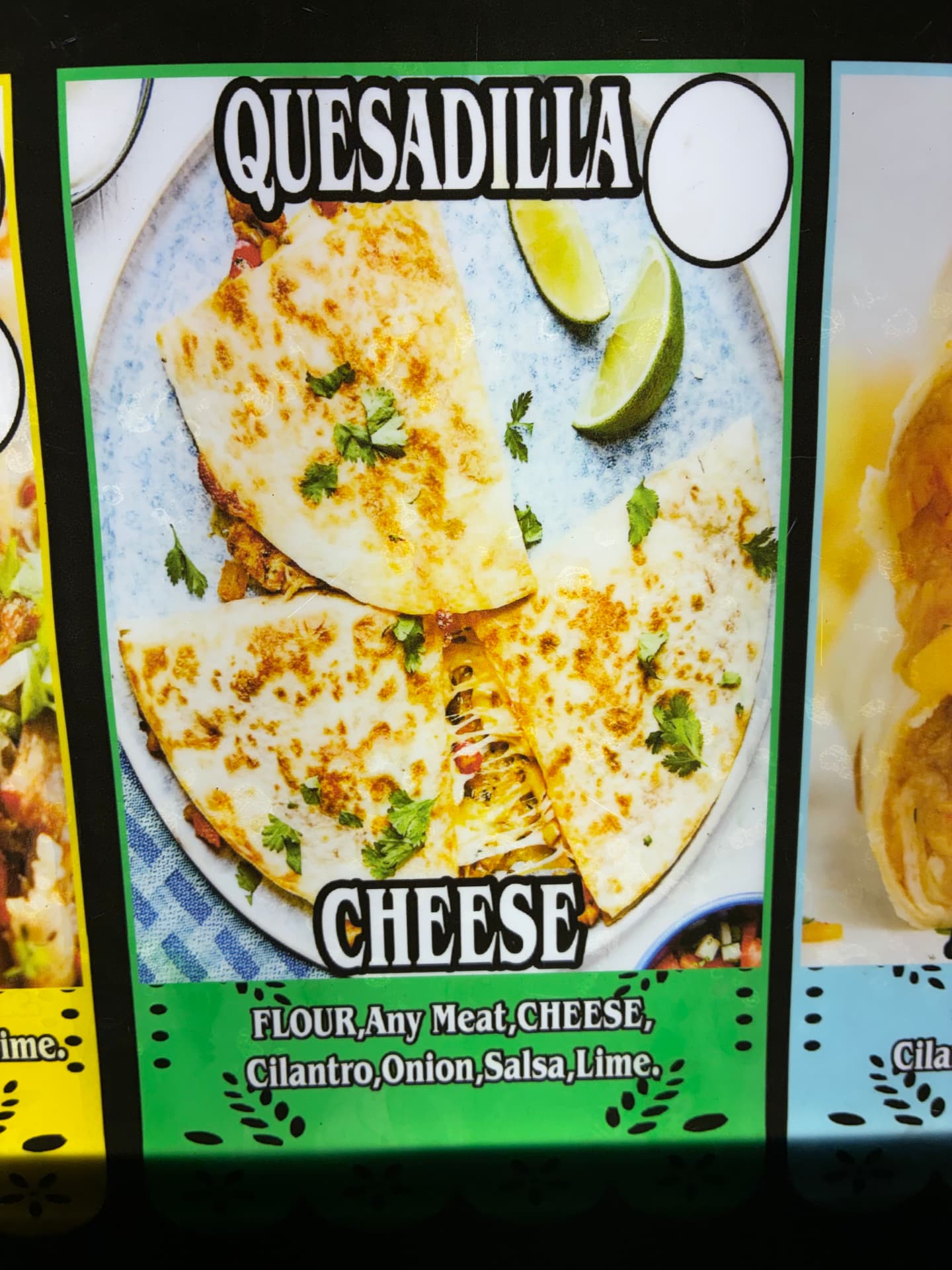 Golden cheese quesadillas served with fresh lime